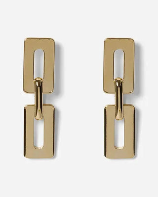 Découvrez les boucles pendantes Karl de Chic Alors chez CQFD Avignon. Un design géométrique en maillons dorés à l'or fin 24k et argent 925, fabriqué à Paris.