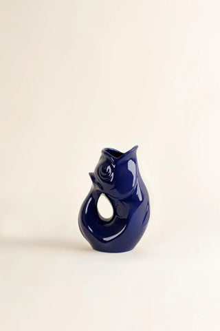 Craquez pour la célèbre carafe GlouGlou bleu encre brillant de la Manufacture de Charolles chez CQFD Avignon. 100% fait main en France. Pièce iconique !