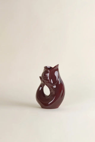 Craquez pour la célèbre carafe GlouGlou bourgogne brillant de la Manufacture de Charolles chez CQFD Avignon. 100% fait main en France. Pièce iconique !