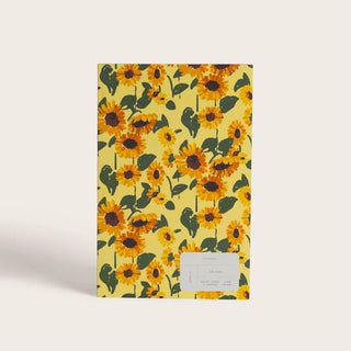 Découvrez le carnet journal Plein Été de Season Paper chez CQFD Avignon. Un carnet de 128 pages éco-conçu et fabriqué en France au motif floral solaire.