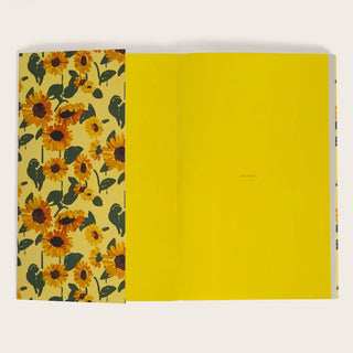 Découvrez le carnet journal Plein Été de Season Paper chez CQFD Avignon. Un carnet de 128 pages éco-conçu et fabriqué en France au motif floral solaire.