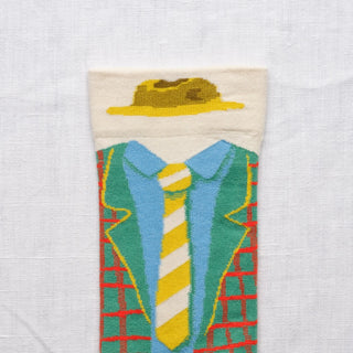 Découvrez les chaussettes "Costume Naturel" de Bonne Maison chez CQFD Avignon. Un design artistique et coloré en coton égyptien premium fabriqué en Europe.