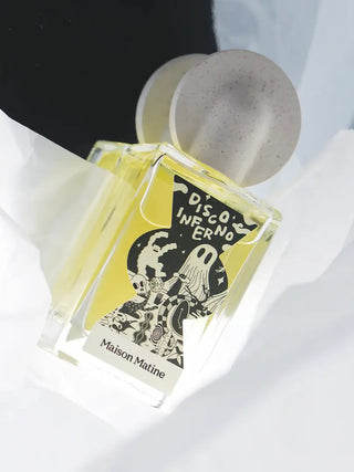 Eau de parfum Disco Inferno 100ml Maison Matine chez CQFD. Parfum ambré, fruité & bois de oud. Alcool bio & Made in France. Flacon graphique 100ml.