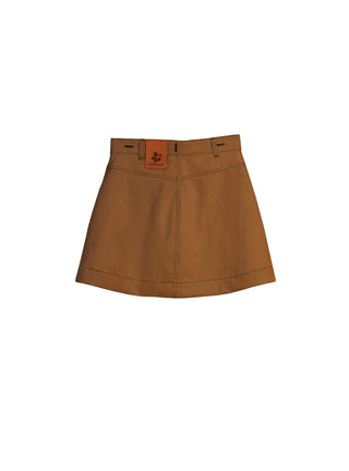 Découvrez la jupe "Mimi" Chicorée de Claudia Carmona chez CQFD Avignon. Une jupe évasée en coton bio recyclé, teinte naturellement et modulable en robe.