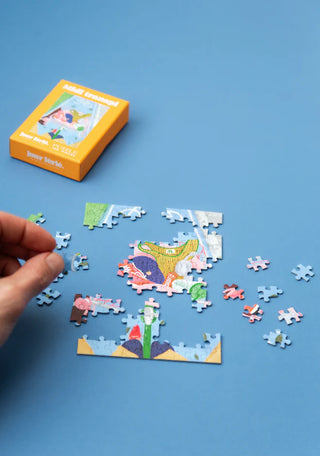 Mini Puzzle 100 pièces Midi Transpi - Jour Férié | Format Voyage