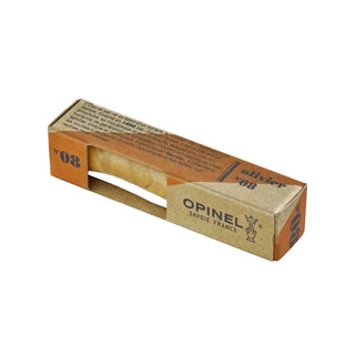 Le légendaire couteau Opinel N°08 avec un manche en bois d'olivier au veinage unique. Lame inox, bague de sécurité Virobloc. Un grand classique chez CQFD Avignon !