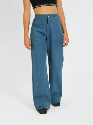 Découvrez le pantalon "Jean" Bleu Baltik de Claudia Carmona chez CQFD Avignon. Un pantalon large modulable en salopette ou combinaison, en coton bio recyclé.
