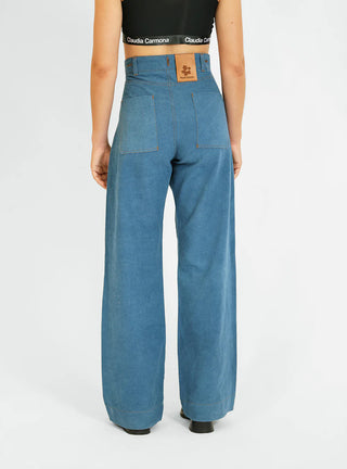 Découvrez le pantalon "Jean" Bleu Baltik de Claudia Carmona chez CQFD Avignon. Un pantalon large modulable en salopette ou combinaison, en coton bio recyclé.