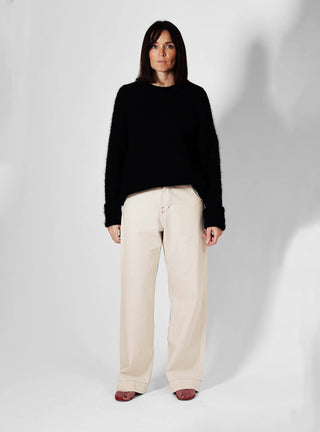 Découvrez le pantalon "Jean" Off-White de Claudia Carmona chez CQFD Avignon. Un pantalon large modulable en salopette, en coton bio recyclé et naturel.