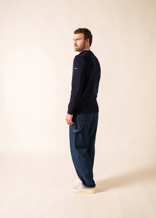 Découvrez le pull Cancale de SAINT JAMES chez CQFD Avignon. Un pull marin traditionnel en version coupe confort. 100% laine vierge, fabriqué en Normandie, France.