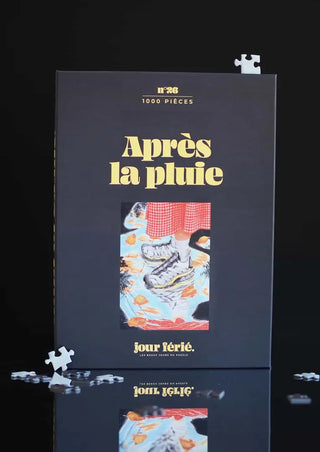 Puzzle 1000 pièces Après La Pluie par Jour Férié. Un défi urbain poétique aux reflets changeants, éco-conçu et fabriqué en France. À shopper chez CQFD Avignon !