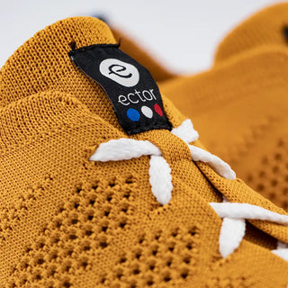 Craquez pour les sneakers Ector Original Moutarde chez CQFD Avignon. Des baskets éco-tricotées en France à Romans-sur-Isère, 100% recyclées, légères et respirantes.