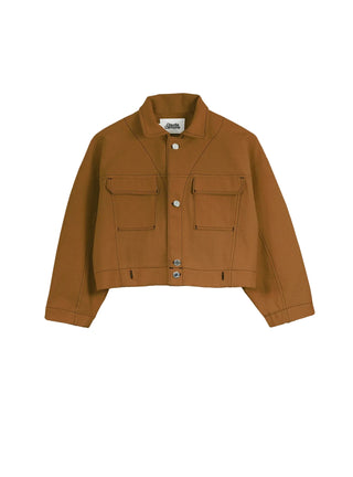 Découvrez la veste "Paca" Chicorée de Claudia Carmona chez CQFD Avignon. Une veste boxy modulable en combinaison, en coton bio recyclé et teinture naturelle au châtaignier.