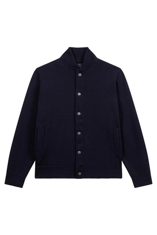 Découvrez la veste Teddy Le Minor en maille Milano bleu marine. 100% laine vierge, fabrication bretonne artisanale. Un blouson chic et durable disponible chez CQFD Avignon.