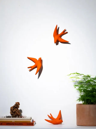 Hirondelle volage en ceramique oursin orange